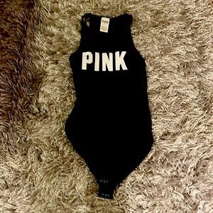 Pink small black body suit
